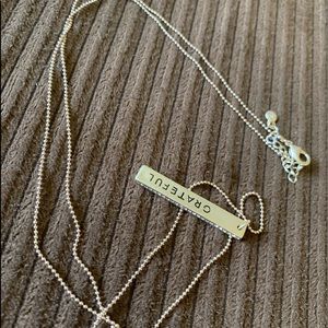 Rachael Ray long necklace.